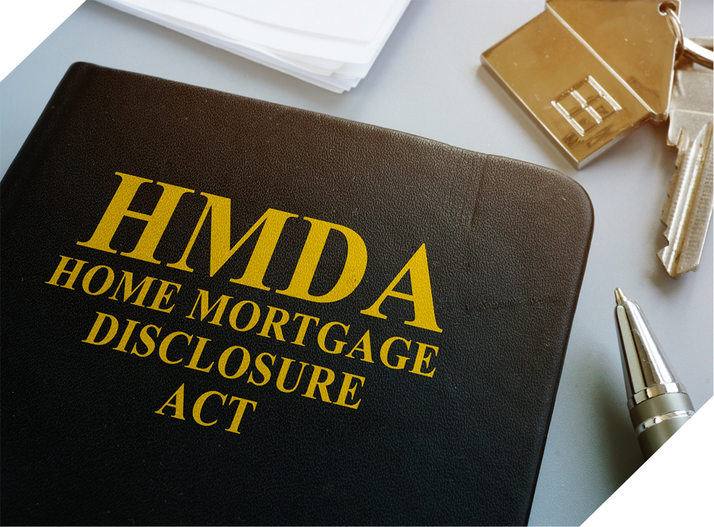 Folder with “HMDA: Home Mortgage Disclosure Act” on the front of it, sitting on a desk